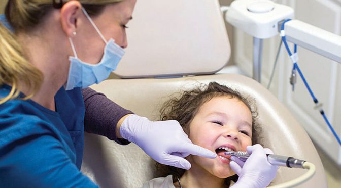 child in dentist's chair