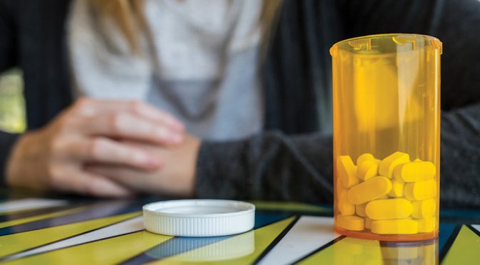 pill bottle on desk